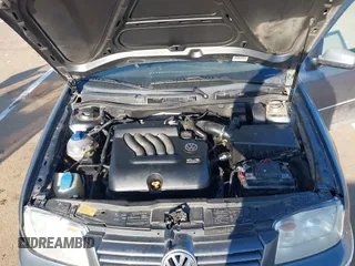 2004 Volkswagen Jetta GL z VIN 3VWRA69M64M044291, wystawiony jako IAAI lot #41882666 z przebiegiem 205 029 mil mil oraz . Historia ofert i sprzedaży dostępna na DreamBid. Obrazek 10.