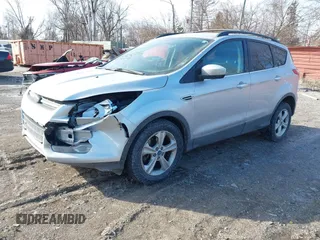 2013 Ford Escape SE with VIN 1FMCU9G98DUD51808, listed as a IAAI auction lot 41527022 with 141,471 mi miles. Bid and sale history available at carsss.com. Image 2.