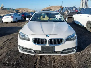2016 BMW 5 Series 528i xDrive with VIN WBA5A7C52GG150287, listed as a IAAI auction lot 41684813 with 128,768 mi miles. Bid and sale history available at carsss.com. Image 12.