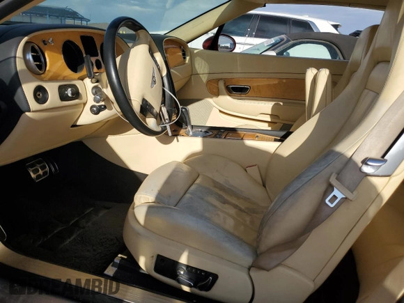 2007 Bentley Continental GT с VIN SCBDR33W47C047424, выставлен на аукционе Copart как лот 50924005 с пробегом 54 802 миль миль и Списание • Salvage title. История ставок и продаж доступна на DreamBid. Изображение 7.