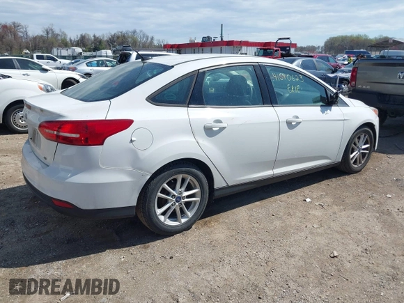 2016 Ford Focus SE with VIN 1FADP3F2XGL354565, listed as a IAAI auction lot 41590623 with 120,047 mi miles. Bid and sale history available at carsss.com. Image 4.