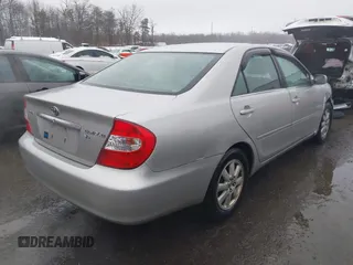 2004 Toyota Camry LE with VIN 4T1BF30K14U578385, listed as a IAAI auction lot 41547709 with 217,434 mi miles. Bid and sale history available at carsss.com. Image 4.