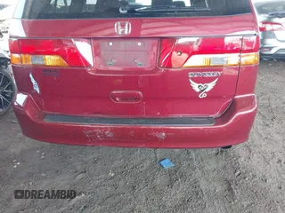 2004 Honda Odyssey EX with VIN 5FNRL186X4B013892, listed as a IAAI auction lot 41731037 with 202,893 mi miles and . Bid and sale history available at DreamBid. Image 6.