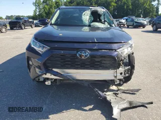 2019 Toyota RAV4 XLE with VIN 2T3W1RFV7KW029959, listed as a Copart auction lot 61825405 with 36,180 mi miles and Salvage title. Bid and sale history available at DreamBid. Image 5.