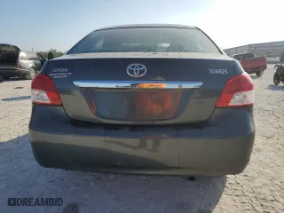 2011 Toyota Yaris with VIN JTDBT4K33B1404938, listed as a Copart auction lot 44312955 with 0 mi miles and Salvage Title. Bid and sale history available at carsss.com. Image 6.
