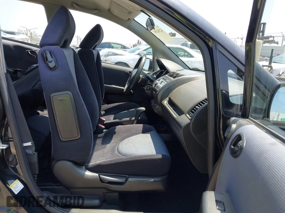 2007 Honda Fit Sport with VIN JHMGD38677S050534, listed as a IAAI auction lot 42382491 with 157,246 mi miles and . Bid and sale history available at DreamBid. Image 5.