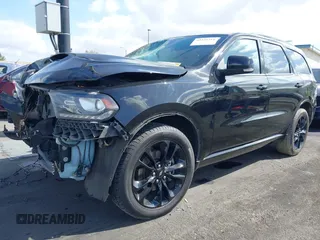 2020 Dodge Durango R/T with VIN 1C4SDJCT5LC330499, listed as a IAAI auction lot 41948714 with 76,254 mi miles and . Bid and sale history available at DreamBid. Image 2.