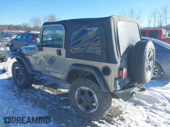 2004 Jeep Wrangler Sahara with VIN 1J4FA59S94P731123, listed as a IAAI auction lot 41288284 with 138,515 mi miles and . Bid and sale history available at DreamBid. Image 3.
