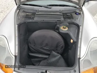 2001 Porsche Boxster с VIN WP0CA29821U621779, выставлен на аукционе Copart как лот 87204984 с пробегом 82 091 миль миль и Списание • Salvage title. История ставок и продаж доступна на DreamBid. Изображение 11.