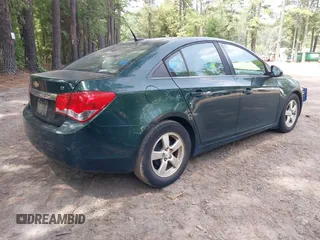 2014 Chevrolet Cruze 1LT with VIN 1G1PC5SB9E7156806, listed as a IAAI auction lot 42813826 with 140,573 mi miles and . Bid and sale history available at DreamBid. Image 4.