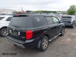 2005 Honda Pilot EX-L with NAVI with VIN 2HKYF187X5H572423, listed as a IAAI auction lot 42088750 with 203,265 mi miles. Bid and sale history available at carsss.com. Image 4.