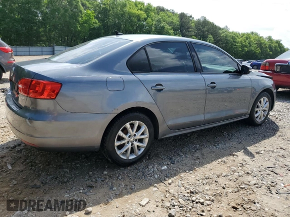 2011 Volkswagen Jetta SE with VIN 3VWDX7AJ2BM361210, listed as a Copart auction lot 53984825 with 223,915 mi miles and Salvage title. Bid and sale history available at DreamBid. Image 3.