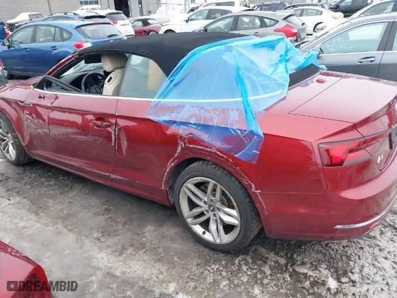 2019 Audi A5 Cabriolet Premium Plus with VIN WAUYNGF56KN002340, listed as a IAAI auction lot 41521638 with 69,381 mi miles. Bid and sale history available at carsss.com. Image 14.