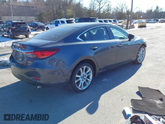 2015 Mazda 6 i Touring with VIN JM1GJ1V60F1170067, listed as a IAAI auction lot 41259559 with 131,055 mi miles and . Bid and sale history available at DreamBid. Image 4.
