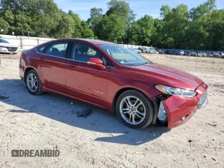2016 Ford Fusion SE Hybrid with VIN 3FA6P0LU7GR162714, listed as a Copart auction lot 57532635 with 151,633 mi miles and Salvage title. Bid and sale history available at DreamBid. Image 4.