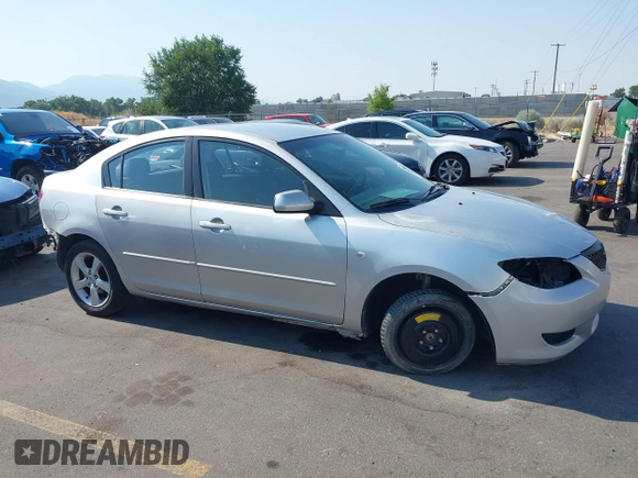 2006 Mazda Mazda3 i with VIN JM1BK12G861534885, listed as a IAAI auction lot 39860656 with 203,722 mi miles. Bid and sale history available at carsss.com. Image 14.