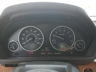 2015 BMW 4 Series 428i with VIN WBA3V7C57FP772880, listed as a Copart auction lot 62740295 with 107,673 mi miles and Salvage title. Bid and sale history available at DreamBid. Image 9.