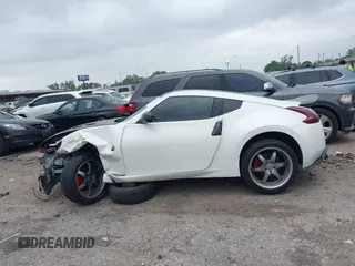 2016 Nissan 370Z Sport z VIN JN1AZ4EH1GM930883, wystawiony jako IAAI lot #41909945 z przebiegiem 80 484 mil mil oraz . Historia ofert i sprzedaży dostępna na DreamBid. Obrazek 15.