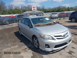 2011 Toyota Corolla L with VIN 2T1BU4EE5BC560999, listed as a IAAI auction lot 42008127 with 130,273 mi miles. Bid and sale history available at carsss.com. Image 1.