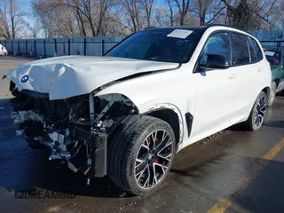 2022 BMW X5 M with VIN 5YMJU0C02N9K39077, listed as a IAAI auction lot 41711996 with 11,875 mi miles. Bid and sale history available at carsss.com. Image 18.