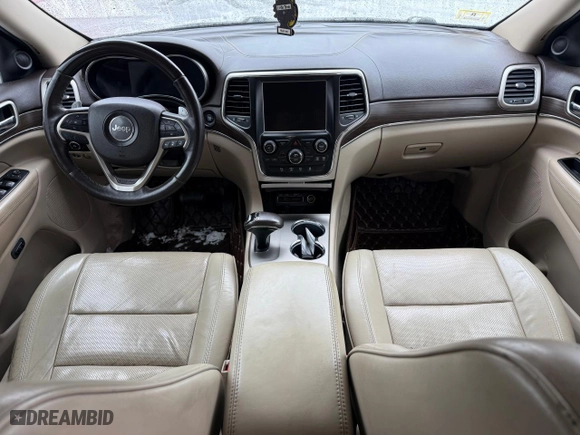 2014 Jeep Grand Cherokee Overland with VIN 1C4RJFCM1EC298621, listed as a Copart auction lot 50373995 with 142,491 mi miles and Clean Title. Bid and sale history available at carsss.com. Image 9.