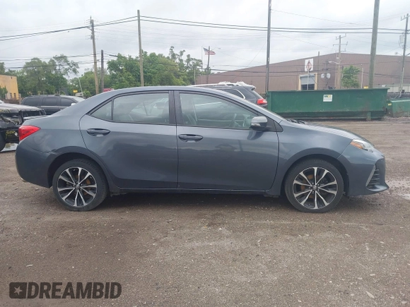 2017 Toyota Corolla L z VIN 5YFBURHE7HP633484, wystawiony jako IAAI lot #42538243 z przebiegiem 80 492 mil mil oraz . Historia ofert i sprzedaży dostępna na DreamBid. Obrazek 13.