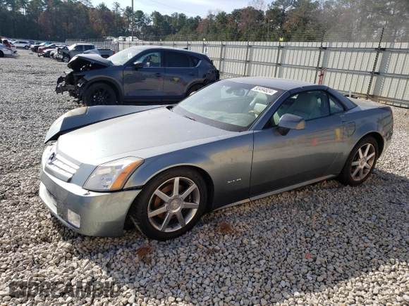 2004 Cadillac XLR z VIN 1G6YV34A845603654, wystawiony jako Copart lot #83494824 z przebiegiem 89 609 mil mil oraz Szkoda całkowita • Salvage title. Historia ofert i sprzedaży dostępna na DreamBid. Obrazek 1.