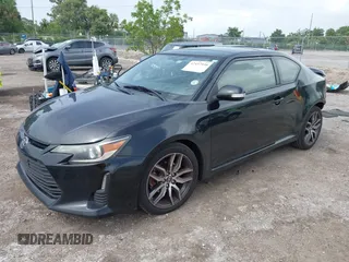 2014 Scion tC z VIN JTKJF5C76E3078256, wystawiony jako IAAI lot #42437930 z przebiegiem 239 399 mil mil oraz . Historia ofert i sprzedaży dostępna na DreamBid. Obrazek 2.