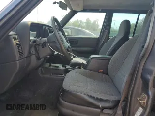 2001 Jeep Cherokee Sport with VIN 1J4FT48S31L596648, listed as a Copart auction lot 54101345 with 190,688 mi miles and Clean Title. Bid and sale history available at carsss.com. Image 7.