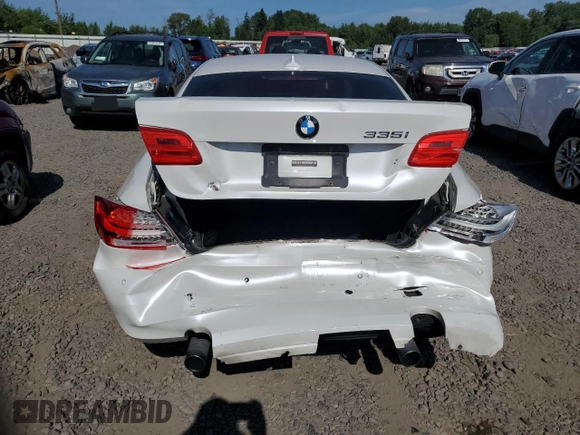 2011 BMW 3 Series 335i xDrive with VIN WBAKF9C51BE620023, listed as a Copart auction lot 60287515 with 123,353 mi miles and Salvage title. Bid and sale history available at DreamBid. Image 6.