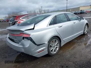 2014 Lincoln MKZ with VIN 3LN6L2G99ER824115, listed as a IAAI auction lot 41946660 with 134,323 mi miles. Bid and sale history available at carsss.com. Image 4.