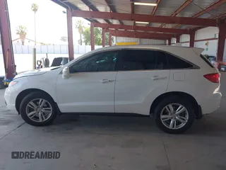2015 Acura RDX with VIN 5J8TB4H30FL021288, listed as a IAAI auction lot 42595955 with 106,186 mi miles and . Bid and sale history available at DreamBid. Image 14.
