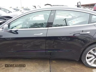 2018 Tesla Model 3 Long Range Battery with VIN 5YJ3E1EB3JF090567, listed as a IAAI auction lot 41568312 with 35,327 mi miles and . Bid and sale history available at DreamBid. Image 15.