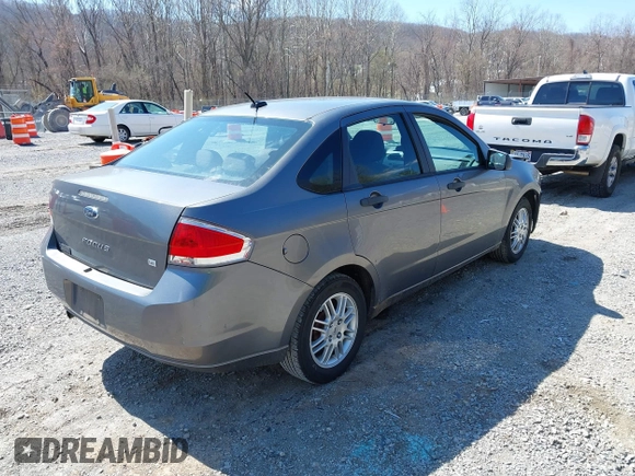 2010 Ford Focus SE with VIN 1FAHP3FN7AW233123, listed as a IAAI auction lot 41892154 with 285,214 mi miles. Bid and sale history available at carsss.com. Image 4.