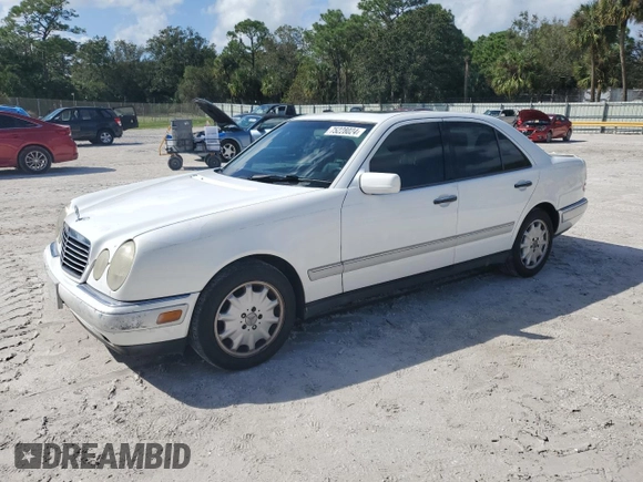 1997 Mercedes-Benz E-Class with VIN WDBJF55F2VJ024815, listed as a Copart auction lot 75228024 with 184,398 mi miles and Non Repairable. Bid and sale history available at carsss.com. Image 1.