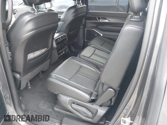 2023 Jeep Wagoneer Series II with VIN 1C4SJVBPXPS515874, listed as a IAAI auction lot 42728894 with 56,284 mi miles and . Bid and sale history available at DreamBid. Image 8.