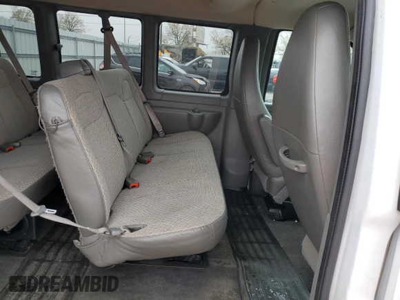 2013 Chevrolet Express Passenger 1LT с VIN 1GAZGYFG4D1190237, выставлен на аукционе Copart как лот 49204764 с пробегом 159 160 миль миль и Списание • Salvage title. История ставок и продаж доступна на DreamBid. Изображение 11.