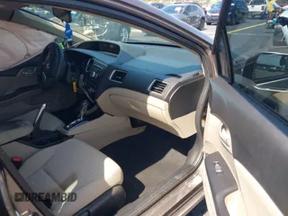 2014 Honda Civic LX z VIN 19XFB2F51EE013227, wystawiony jako IAAI lot #42223609 z przebiegiem 105 181 mil mil oraz . Historia ofert i sprzedaży dostępna na DreamBid. Obrazek 5.