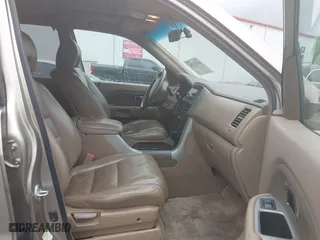 2007 Honda Pilot EX-L with VIN 5FNYF28557B016204, listed as a IAAI auction lot 41973596 with 161,398 mi miles. Bid and sale history available at carsss.com. Image 5.