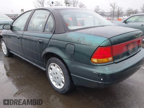 1996 Saturn SL with VIN 1G8ZK5277TZ293544, listed as a IAAI auction lot 41858643 with 189,450 mi miles and . Bid and sale history available at DreamBid. Image 6.