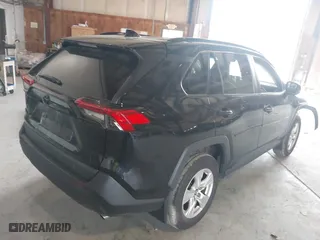 2021 Toyota RAV4 XLE with VIN 2T3P1RFV0MW151943, listed as a IAAI auction lot 39720685 with 55,536 mi miles. Bid and sale history available at carsss.com. Image 4.