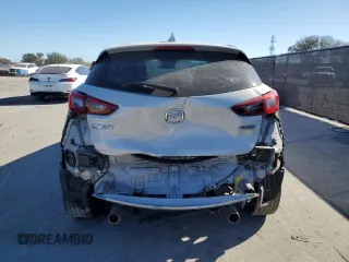 2018 Mazda CX-3 Touring with VIN JM1DKDC77J0305749, listed as a Copart auction lot 86524474 with 112,562 mi miles and Salvage Title. Bid and sale history available at DreamBid. Image 6.