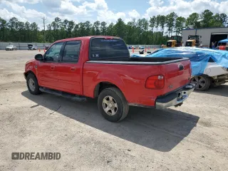 2003 Ford F-150 XLT with VIN 1FTRW07623KC62353, listed as a Copart auction lot 63618214 with 267,360 mi miles and Clean Title. Bid and sale history available at carsss.com. Image 2.