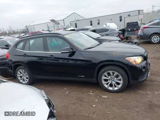 2014 BMW X1 xDrive28i with VIN WBAVL1C5XEVY16666, listed as a IAAI auction lot 41924589 with 98,731 mi miles. Bid and sale history available at carsss.com. Image 14.