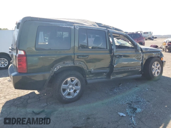 2007 Jeep Commander Sport with VIN 1J8HG48K27C663745, listed as a Copart auction lot 75741314 with 194,534 mi miles and Salvage Title. Bid and sale history available at carsss.com. Image 3.