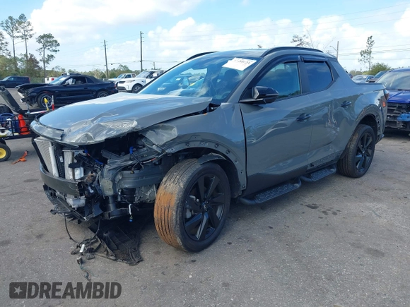 2023 Hyundai Santa Cruz Night Edition z VIN 5NTJCDAF0PH054192, wystawiony jako IAAI lot #40734723 z przebiegiem 9 700 mil mil oraz . Historia ofert i sprzedaży dostępna na DreamBid. Obrazek 18.