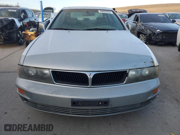 2000 Mitsubishi Diamante LS z VIN 6MMAP67P5YT006608, wystawiony jako Copart lot #49009455 z przebiegiem 241 503 mil mil oraz Tytuł czysty. Historia ofert i sprzedaży dostępna na DreamBid. Obrazek 5.