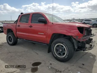 2014 Toyota Tacoma with VIN 3TMLU4EN3EM156907, listed as a Copart auction lot 49350155 with 71,361 mi miles and Salvage Title. Bid and sale history available at DreamBid. Image 4.