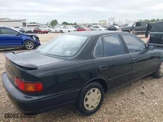 1996 Toyota Camry DX with VIN 4T1BG12K6TU754392, listed as a IAAI auction lot 42013697 with 172,410 mi miles. Bid and sale history available at carsss.com. Image 4.