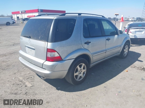 2003 Mercedes-Benz M-Class 3.2L with VIN 4JGAB54E23A383144, listed as a IAAI auction lot 41782124 with 148,084 mi miles. Bid and sale history available at carsss.com. Image 4.
